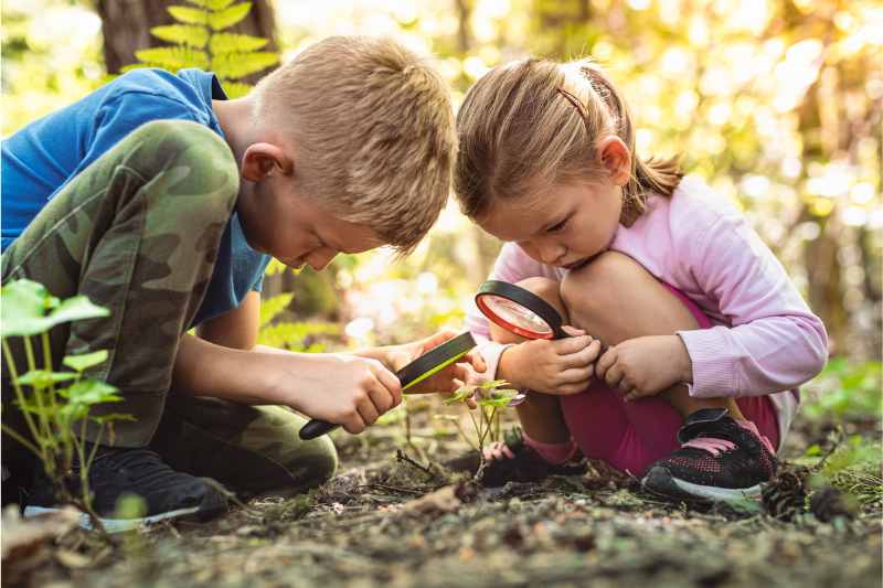 How To Nurture Critical Thinking Skills In Young Children -Kids with Magnifying Glass